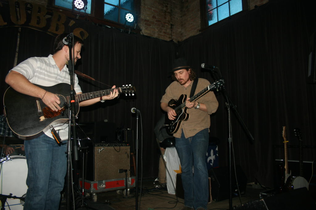 Greg Essington, right, plays with lead singer Zack Kibodeaux during a sound check at Stubb's BBQ in Austin.
