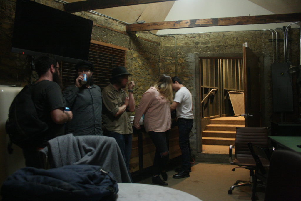 Blue Water Highway Band relaxes in the Stubb's green room before a show. From left are ASK GREG FOR NAMES.